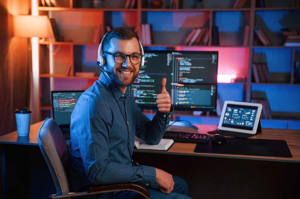 showing thumb up professional programmer is worki 2025 03 18 19 43 44 utc