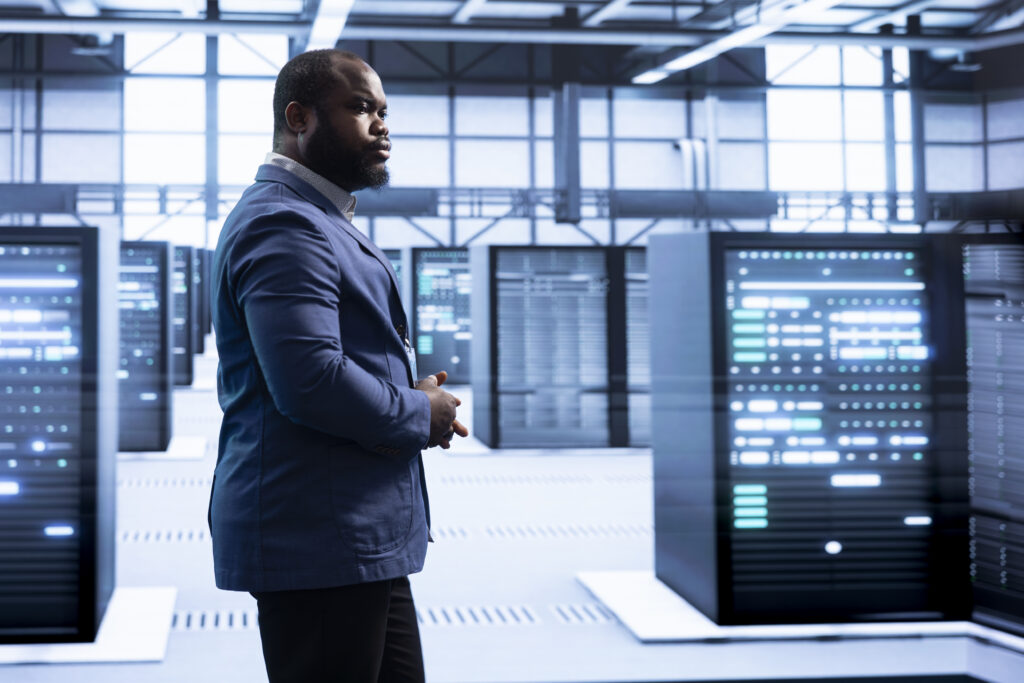 supervisor overseeing server room, doing hardware maintenance